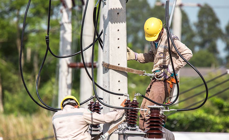 Technicians repairing cables